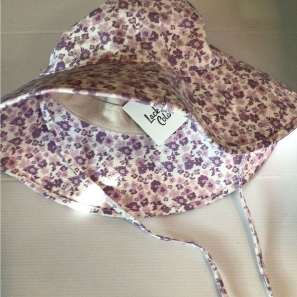 NEW! Rare Lack of Color lilac blooms bucket hat