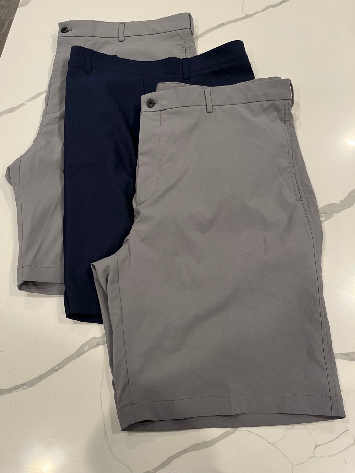 Lot of men’s size 42 Under Armour & Greg Norman