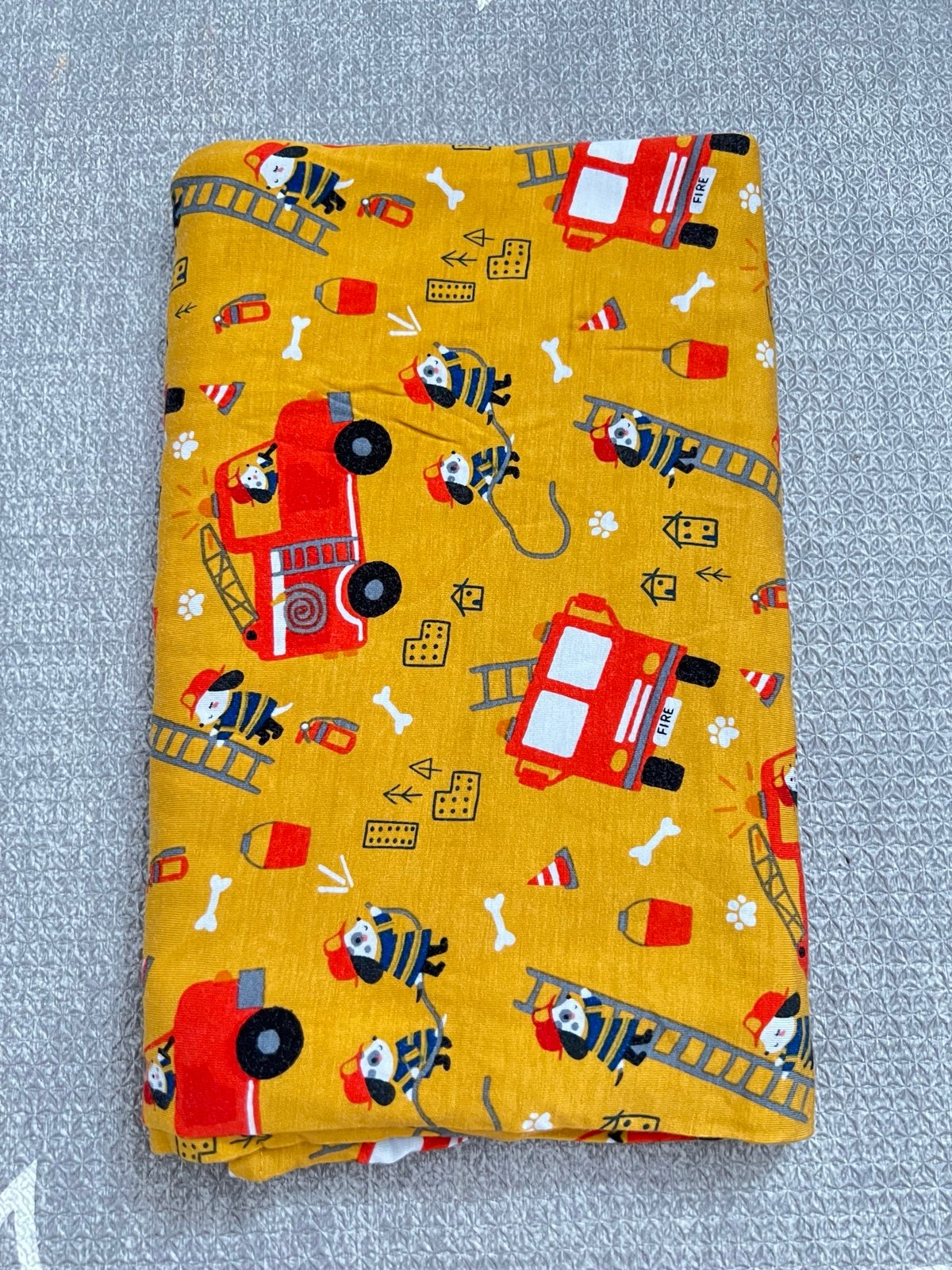 Little Sleepies Fire Pup swaddle