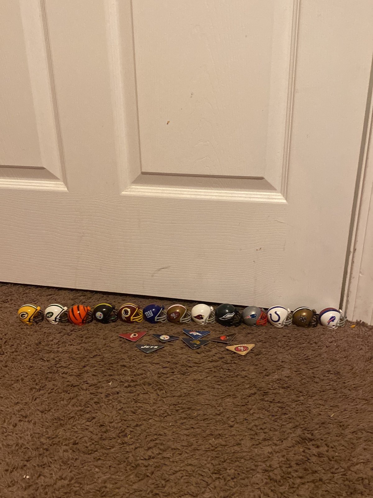 Little NFL helmets