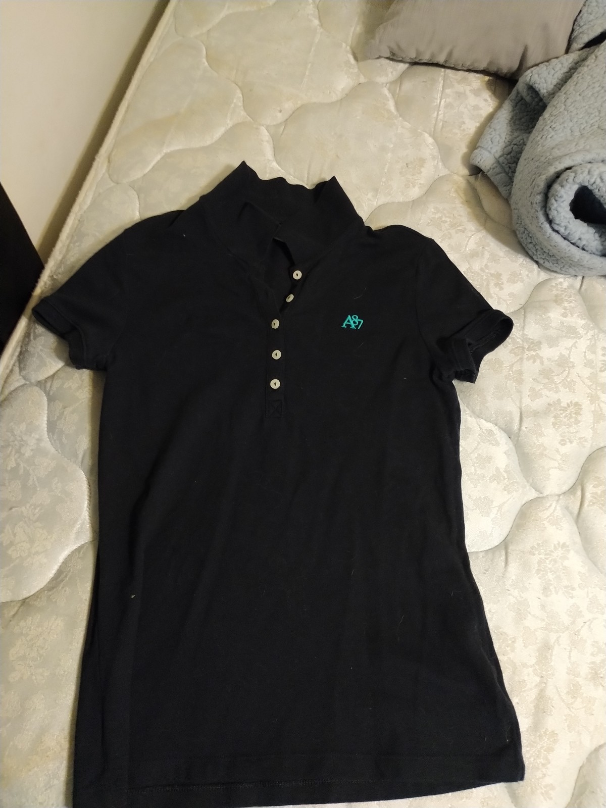 black polo shirts