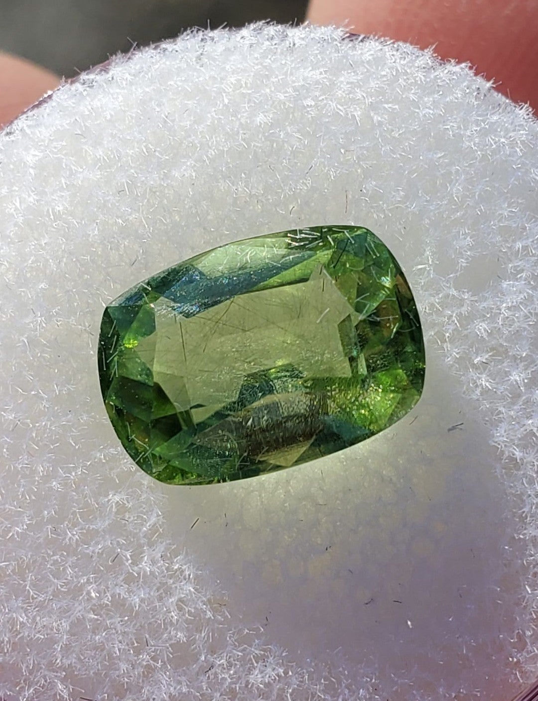 Kashmir Peridot w/ Ludwigite Needles, Pakistan 11x7.5x5.5 mm3.90 cts
