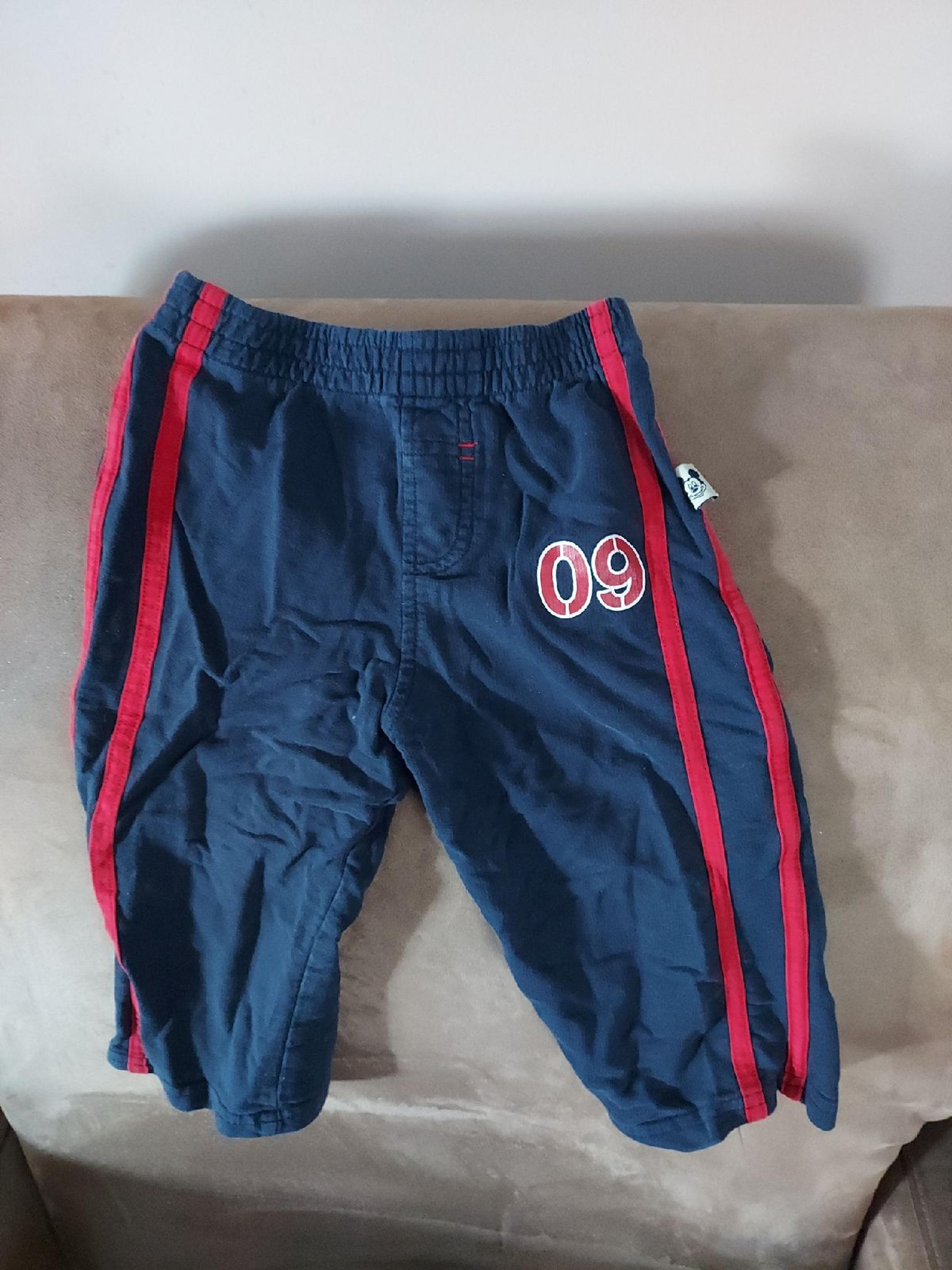 Navy pants with red stripe