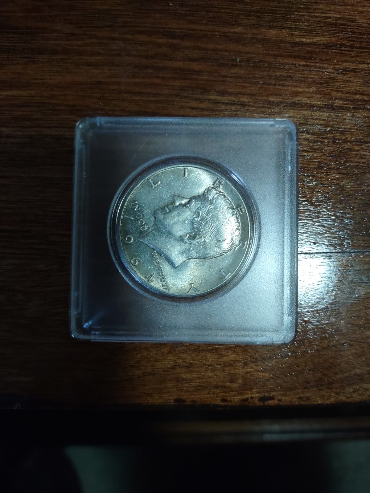 1964 Kennedy silver dollar asking 200 very sought after coin