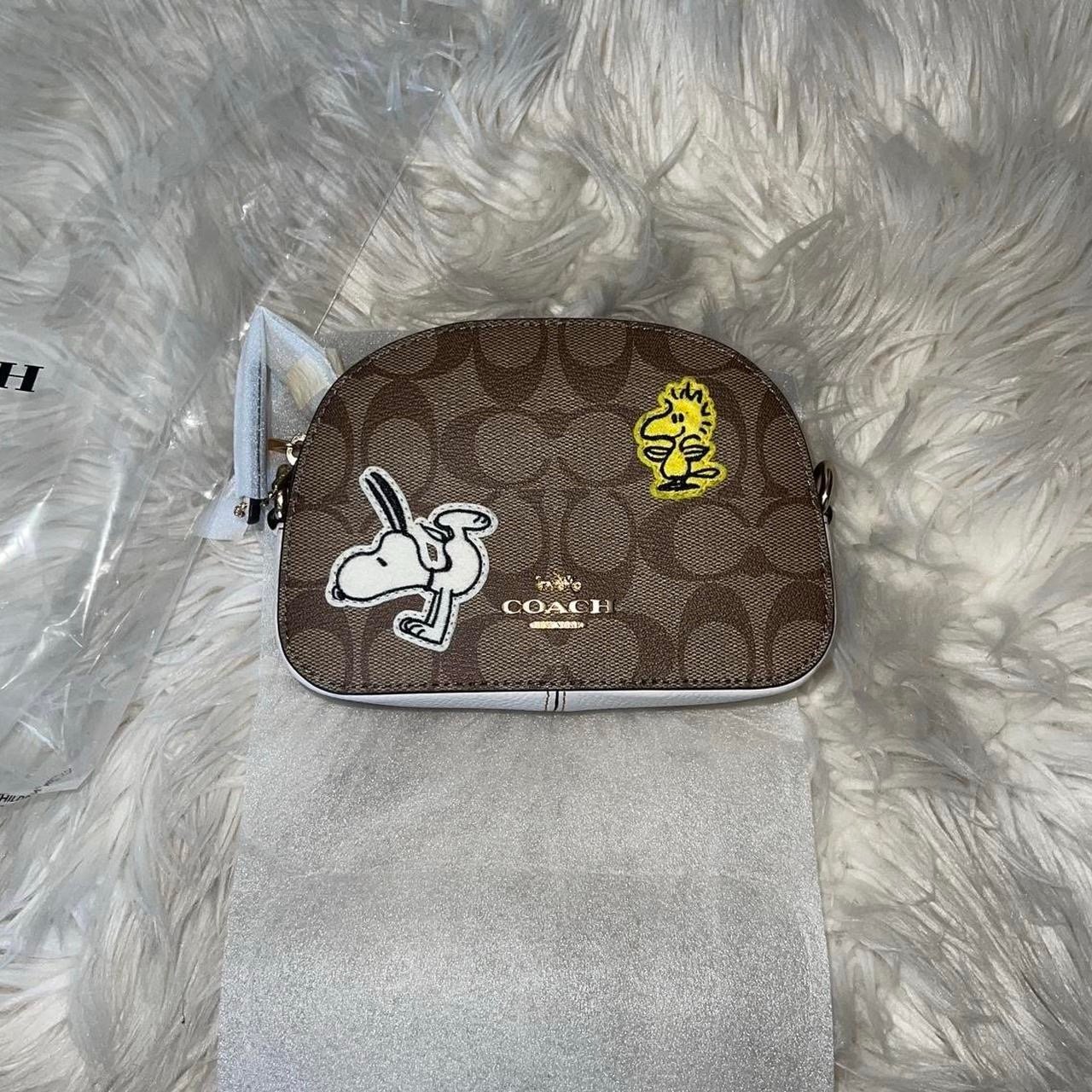 Brand new coach crossbody bag with peanuts snoopy and Woodstock print