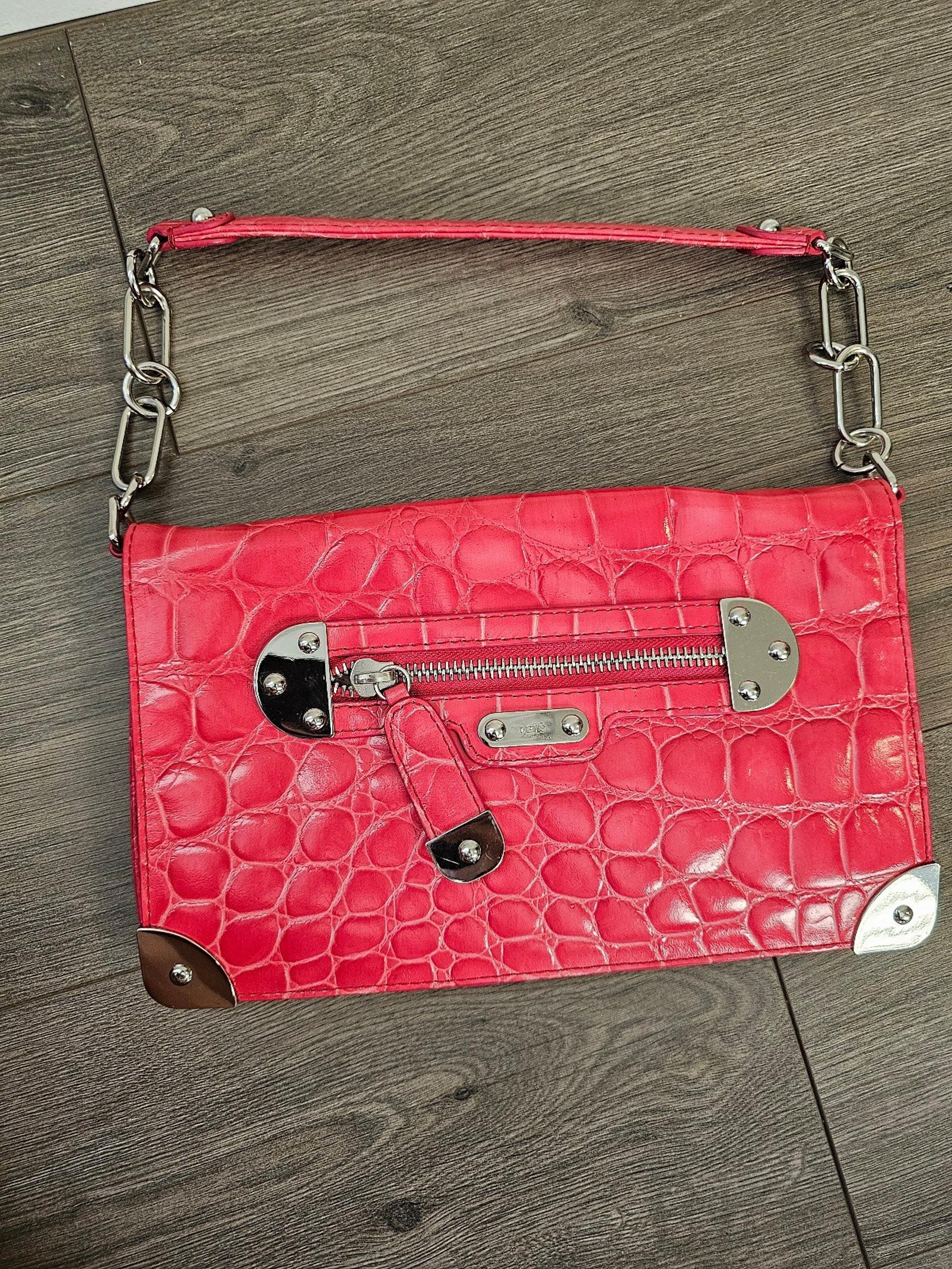 Rafe New York woman's pink faux reptile handbag