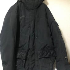 Four images of a Columbia down jacket in Portland, Oregon.