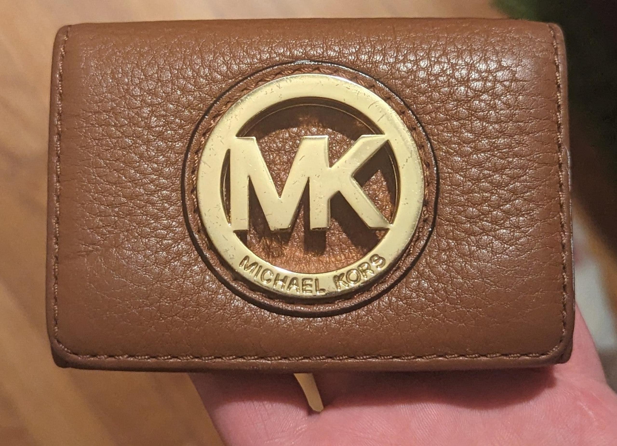 EUC Michael Kors brown soft pebbled leather gold MK circular cut out in center
