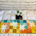 Multi colored squares and stars quilted