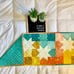 Multi colored squares and stars quilted