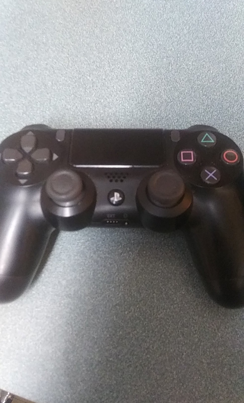 2 PS4 controllers and microphoned headset and headphones