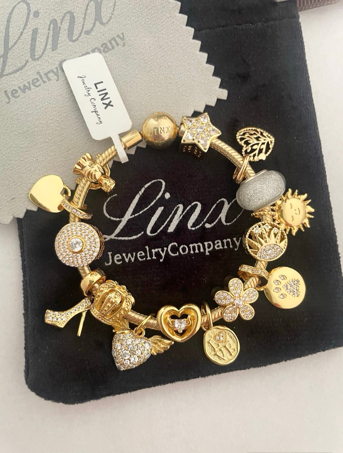 Linx Yellow Gold Snake Chain Bracelet with Gold Charms