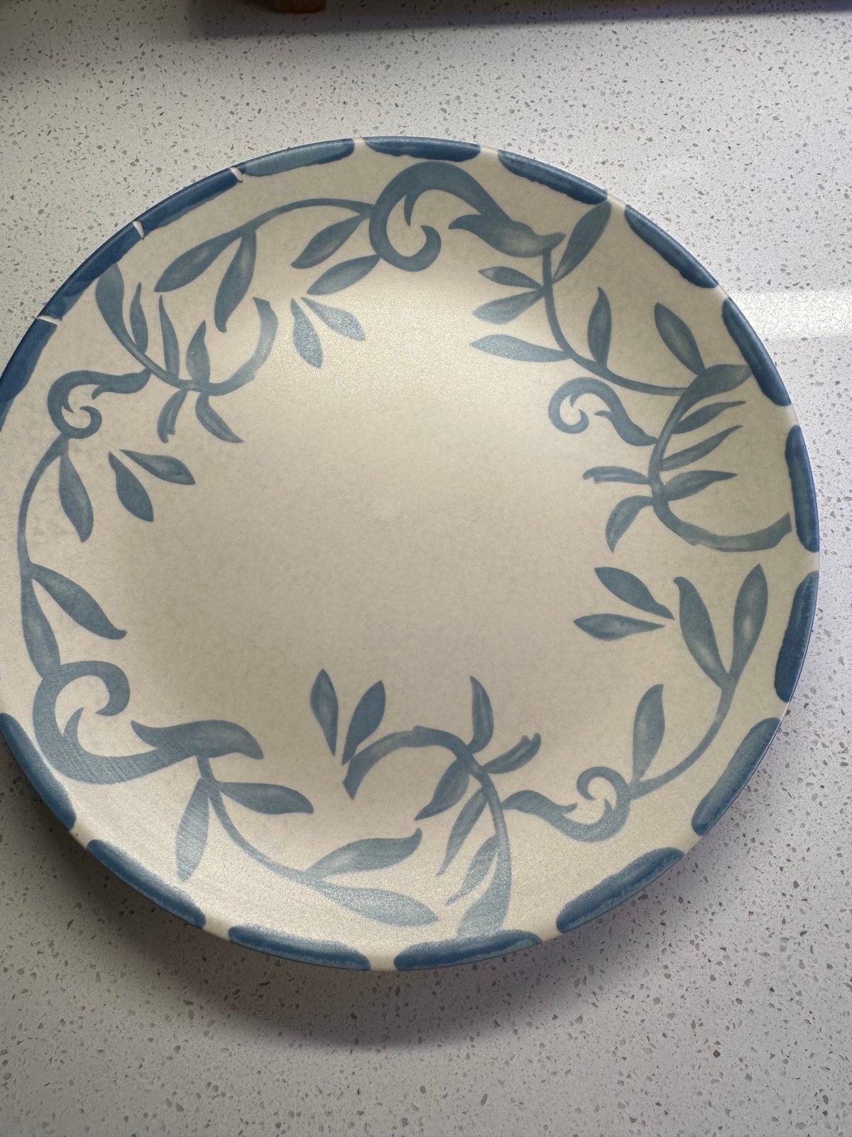 Blue and cream plates and bowls