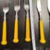 Vintage MCM Oxford Hall 1973 Stainless Flatware Japan Yellow Handle 12 Pieces