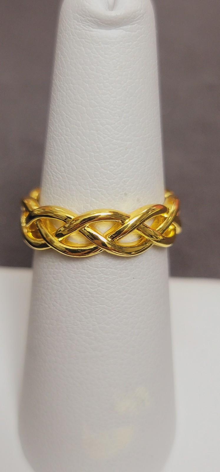 R625 Polished Open Weave Eternity Band. Size 7.