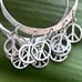 vintage sterling silver Bohemian circle hoop with dangle peace charms earrings