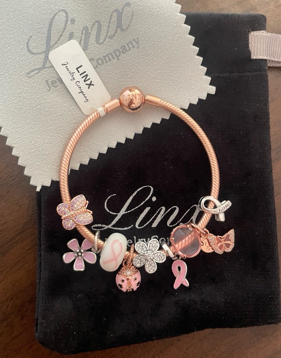 Linx Rose Gold Snake Chain Bracelet with Breast Cancer Awareness Themed Charms