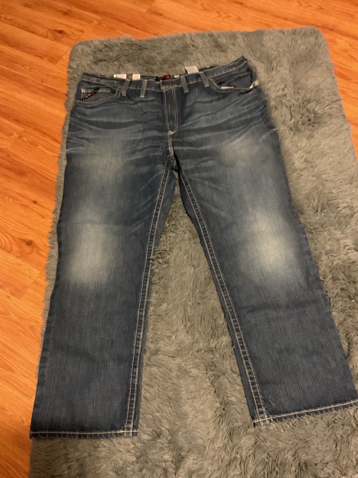 Ariat FR Low Rise M4 Boot Jeans Men’s Size 48 x 32 NWT Small Hole