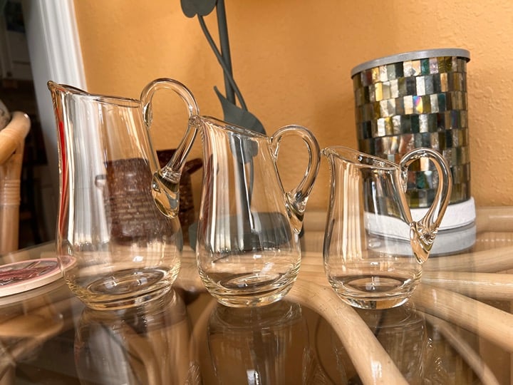 3 Beautiful vintage glass pitchers. In excellent condition
