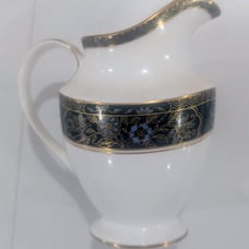 Royal Doulton small cream pitcher, New. Never used.