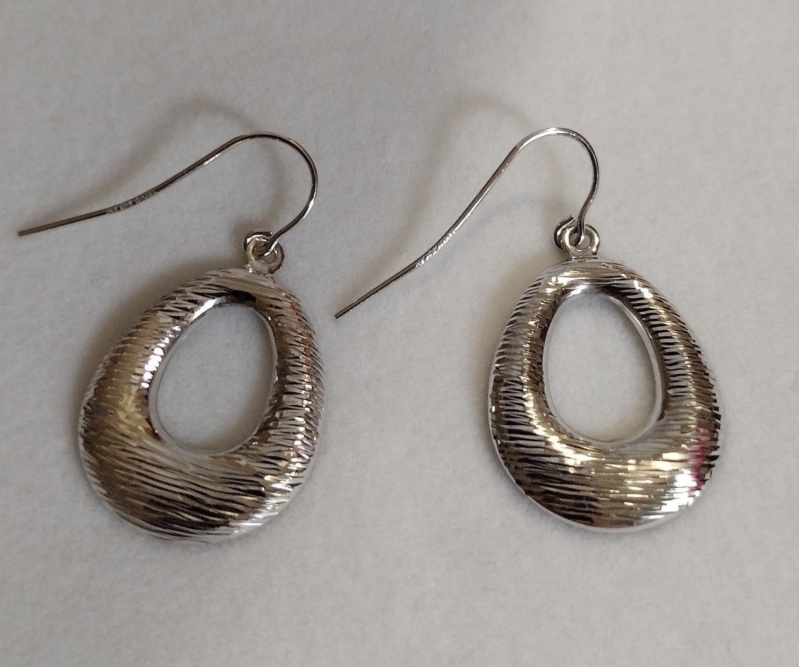 14k white gold earrings. QVC
