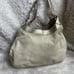 Coach Lynn Soho Beige Leather Gold Patent Leather Shoulder Bag. The Black compar