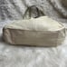 Coach Lynn Soho Beige Leather Gold Patent Leather Shoulder Bag. The Black compar