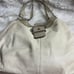 Coach Lynn Soho Beige Leather Gold Patent Leather Shoulder Bag. The Black compar