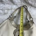 Coach Lynn Soho Beige Leather Gold Patent Leather Shoulder Bag. The Black compar