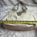 Coach Lynn Soho Beige Leather Gold Patent Leather Shoulder Bag. The Black compar