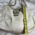 Coach Lynn Soho Beige Leather Gold Patent Leather Shoulder Bag. The Black compar