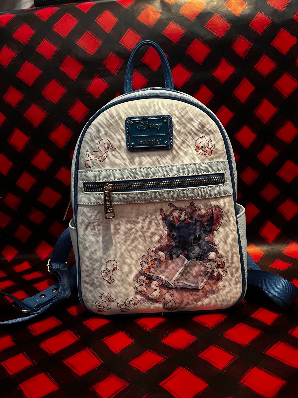 Stitch reading Loungefly