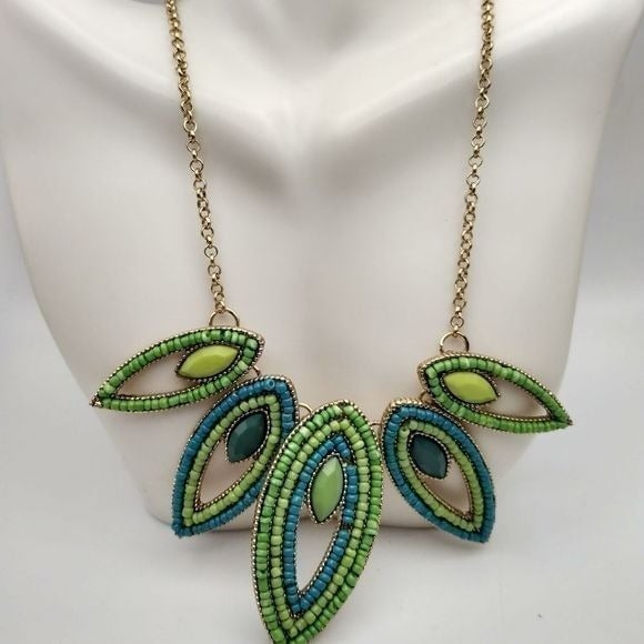 Erica Lyons statement seed beaded green tribal spiked teardrop necklace