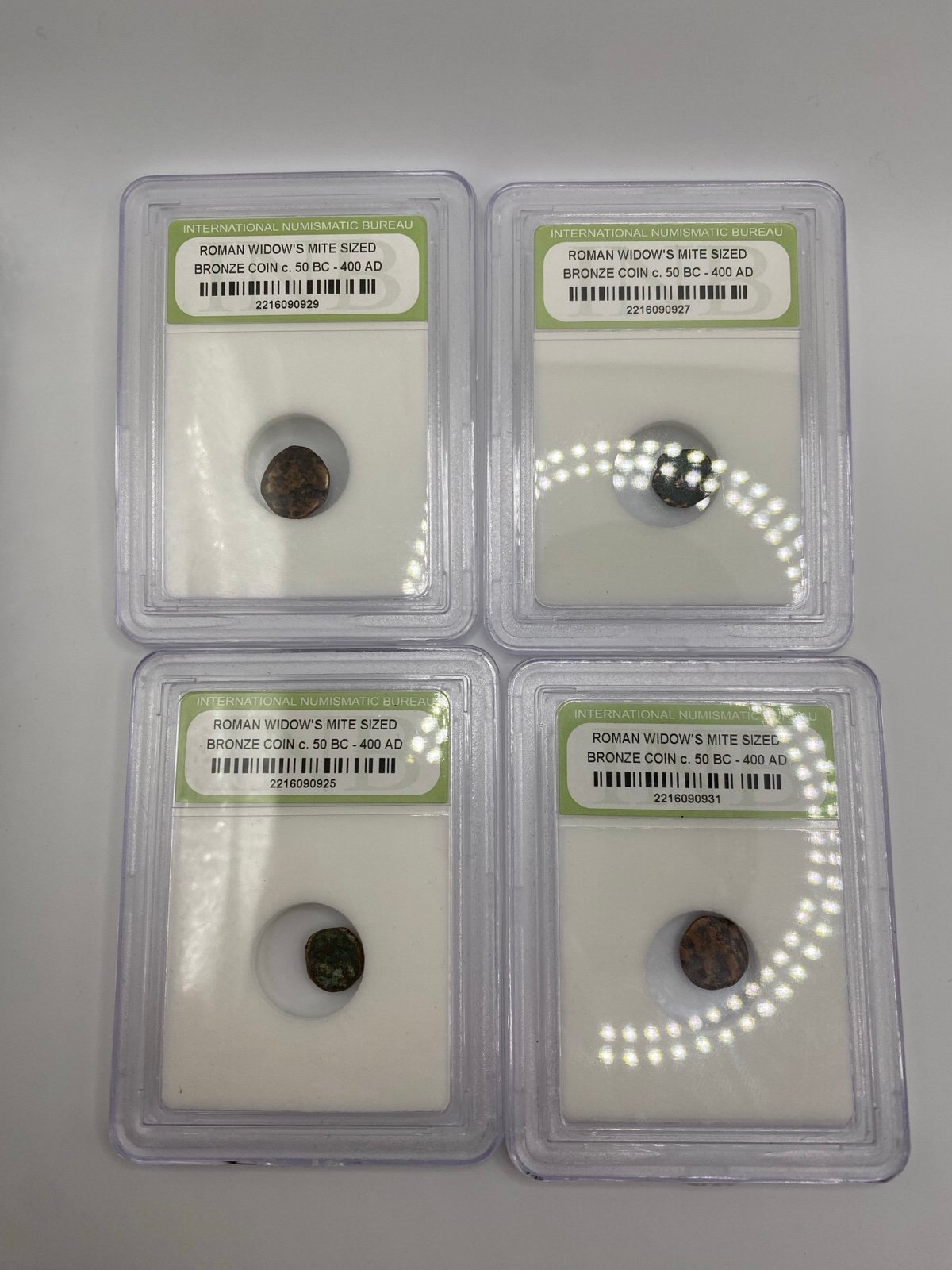 Lot of 4 Ancient Roman Widows Mite Sized Bronze Coins (Slabbed)