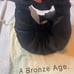 A Bronze Age Satin Croissant Bag