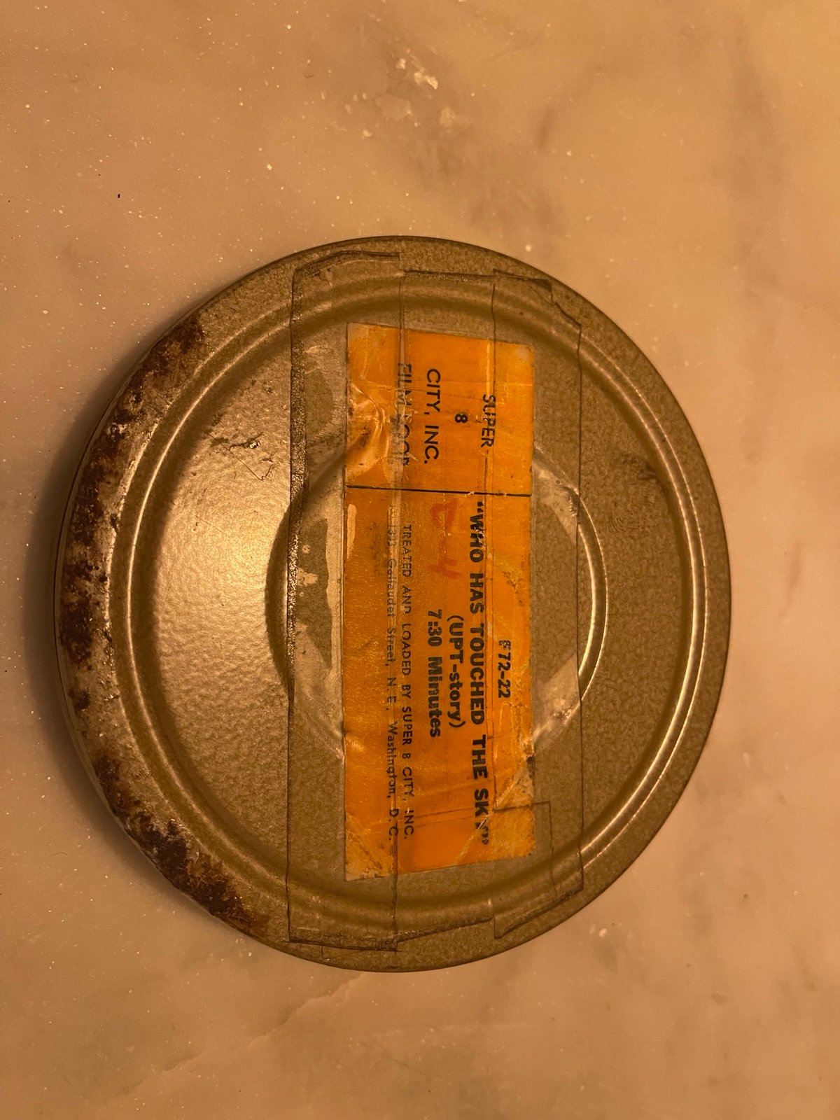 Vintage Metal Film Reel Canister Containing a Super 8 film titled Who Has Touch
