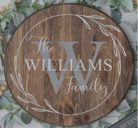 Custom wood round family name sign