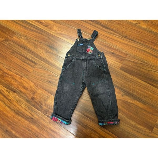 Osh Kosh B’Gosh Vintage black overalls with plaid accents.