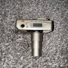 Samsung Evoca 140S Quartz Date Multi AF Film Camera Gold 2000 Millenium Edition