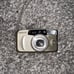 Samsung Evoca 140S Quartz Date Multi AF Film Camera Gold 2000 Millenium Edition