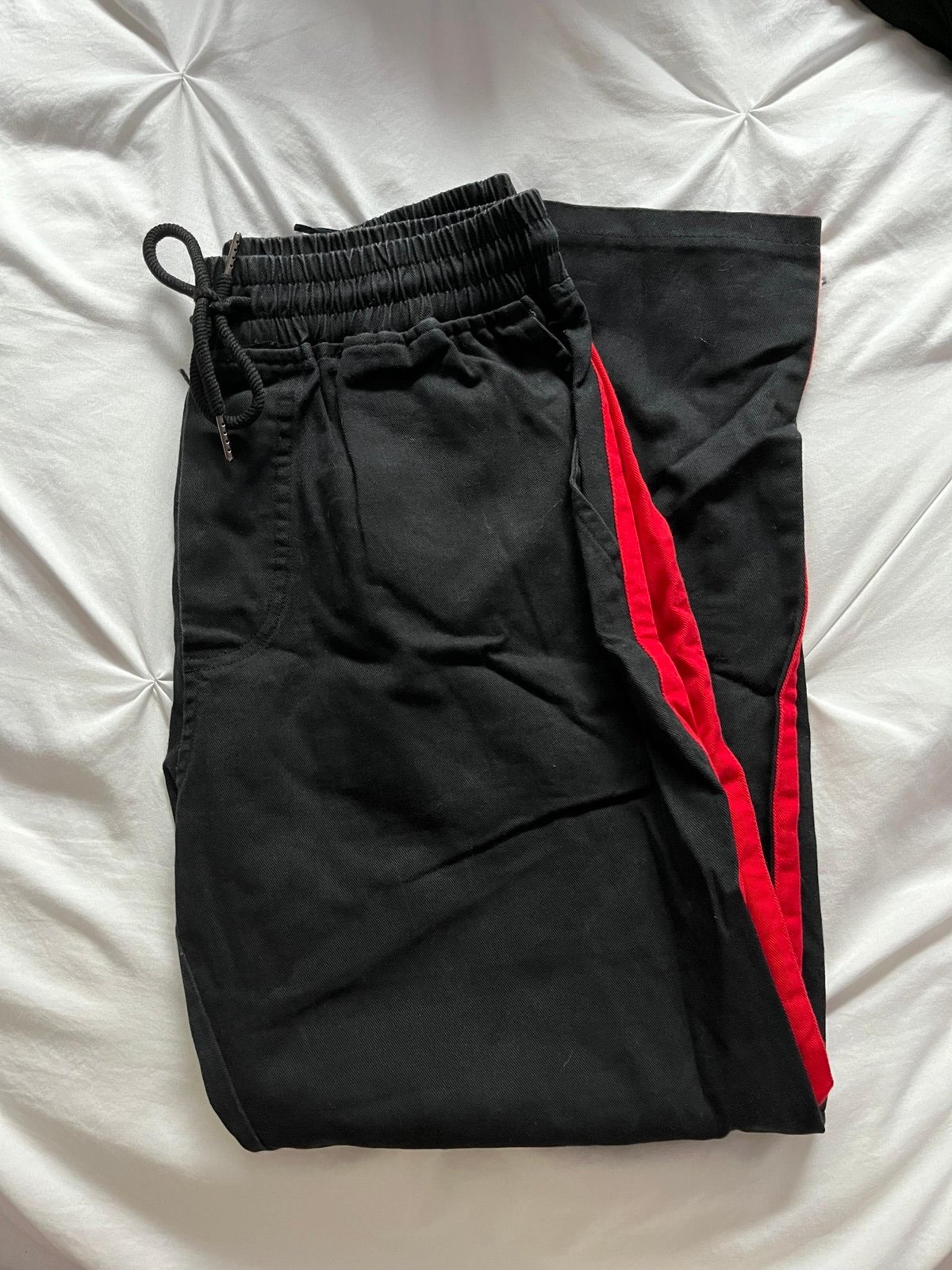 LF black pants with red stripe
