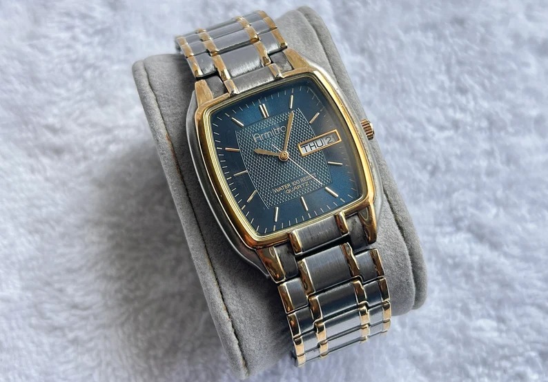 Modern Armitron Day/Date Two-Tone Gold Plated Stainless Steel Quartz Watch