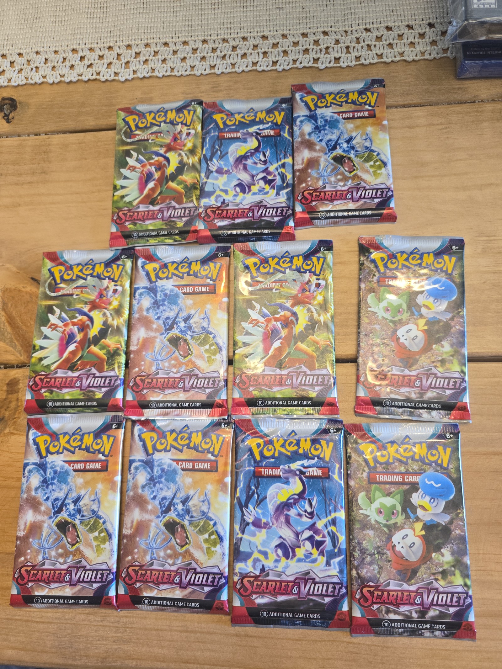 11x Scarlet and Violet Base Set Factory Sealed Booster Packs Pokemon Center