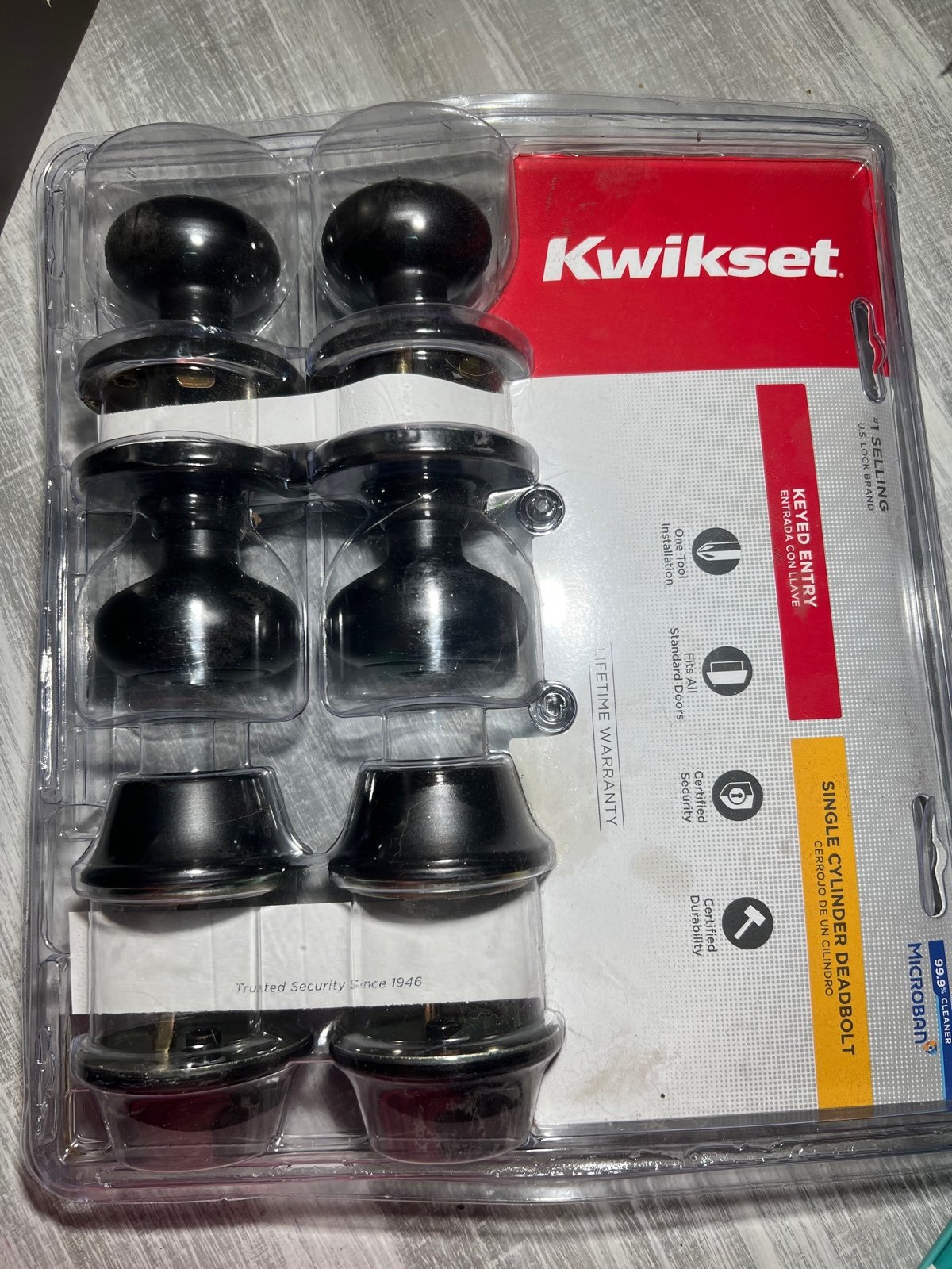 Kwikset bronze keyed entry door knob and deadbolt set of 2.