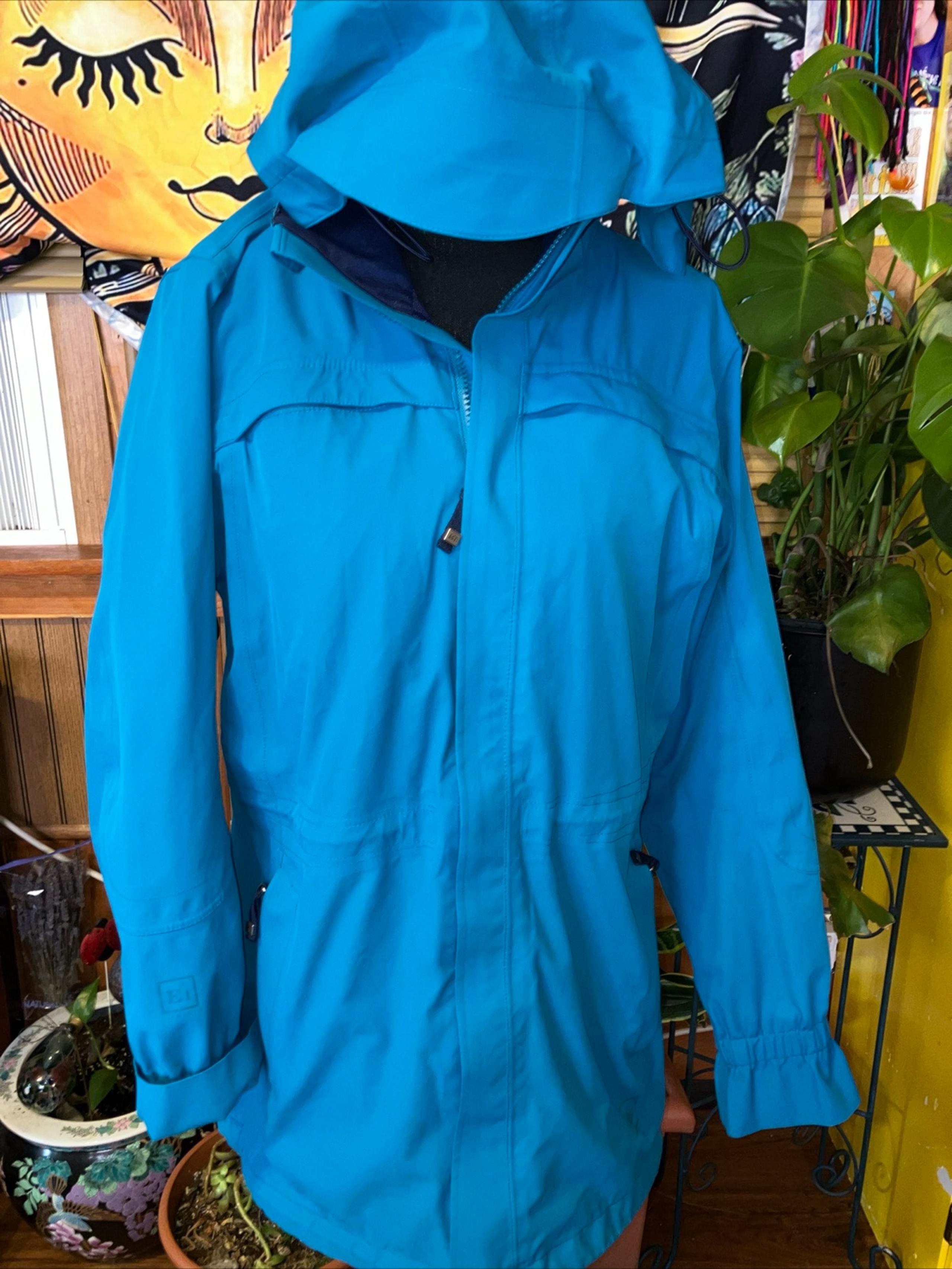 REI blue hooded women’s medium jacket light weight