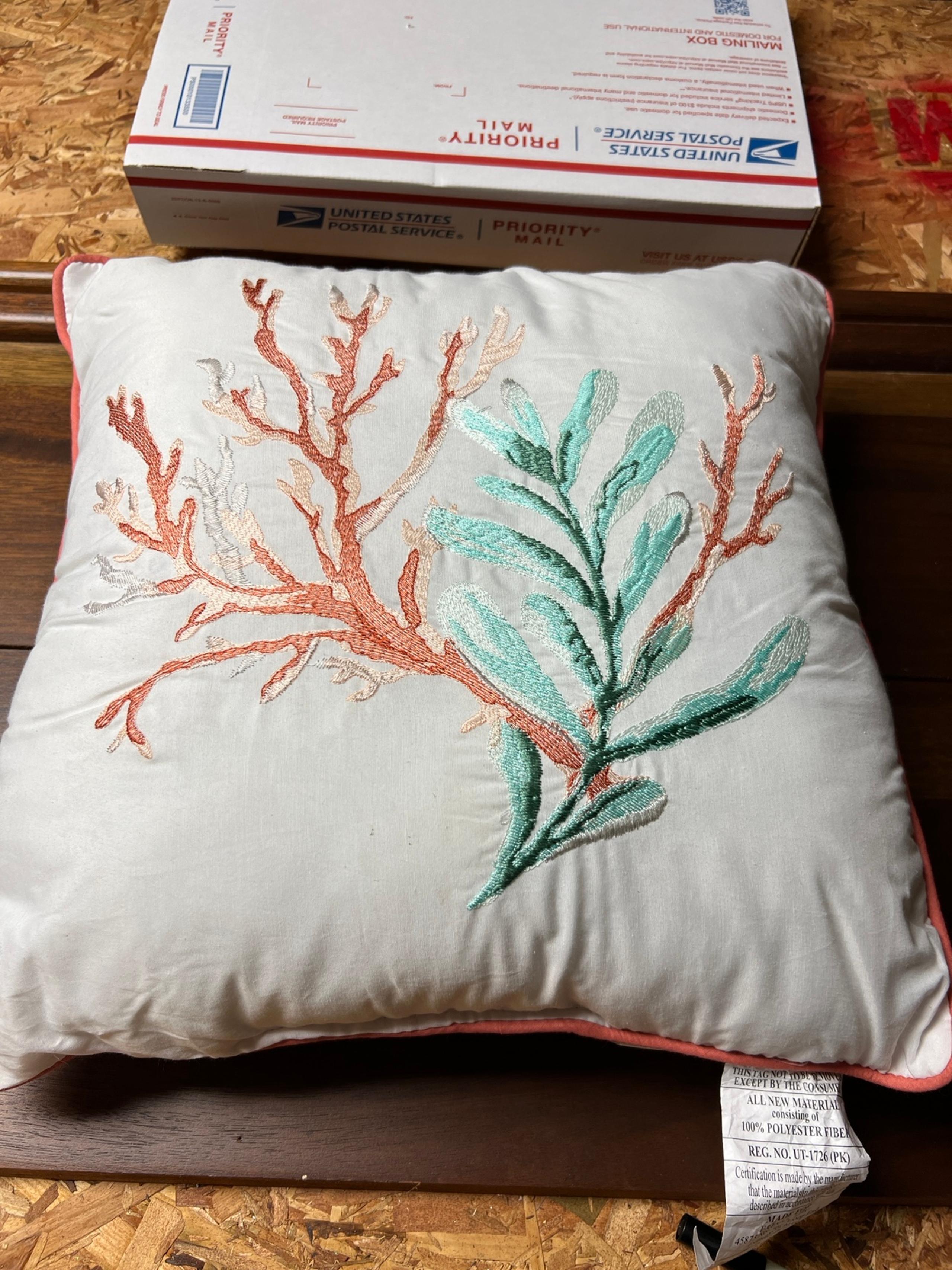 Madison Park decorative pillow embroidered with coral