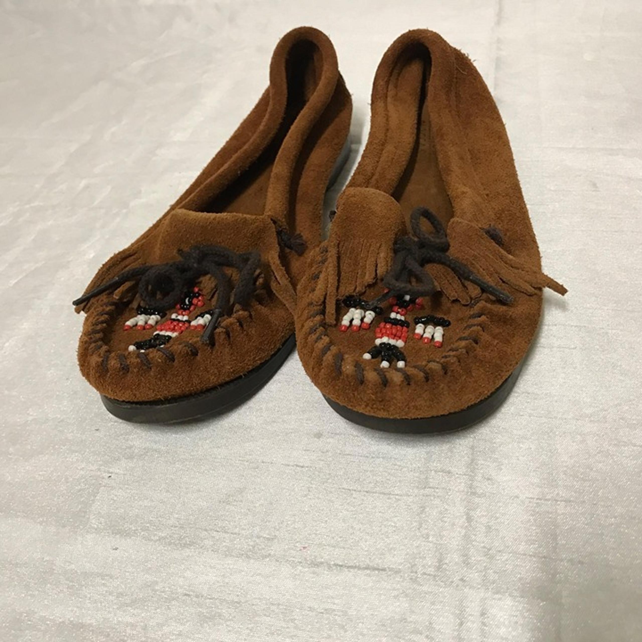 Women's Minnetonka Moccasin’s, Brown leather moccasin’s, Slip on and Slide on sh
