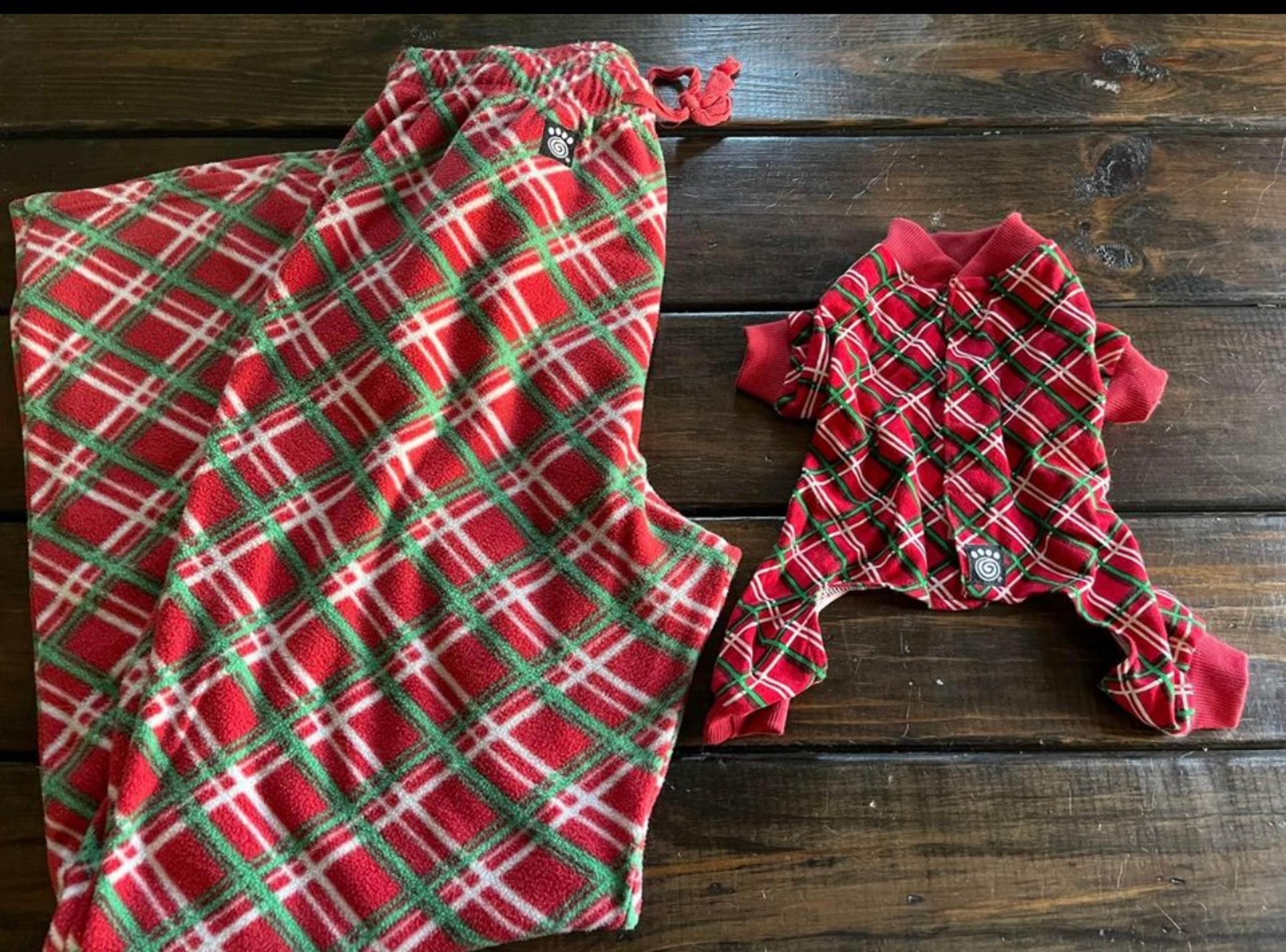 Paws matching Christmas pajamas with your doggie