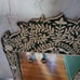 Wooden mirror with stone design
