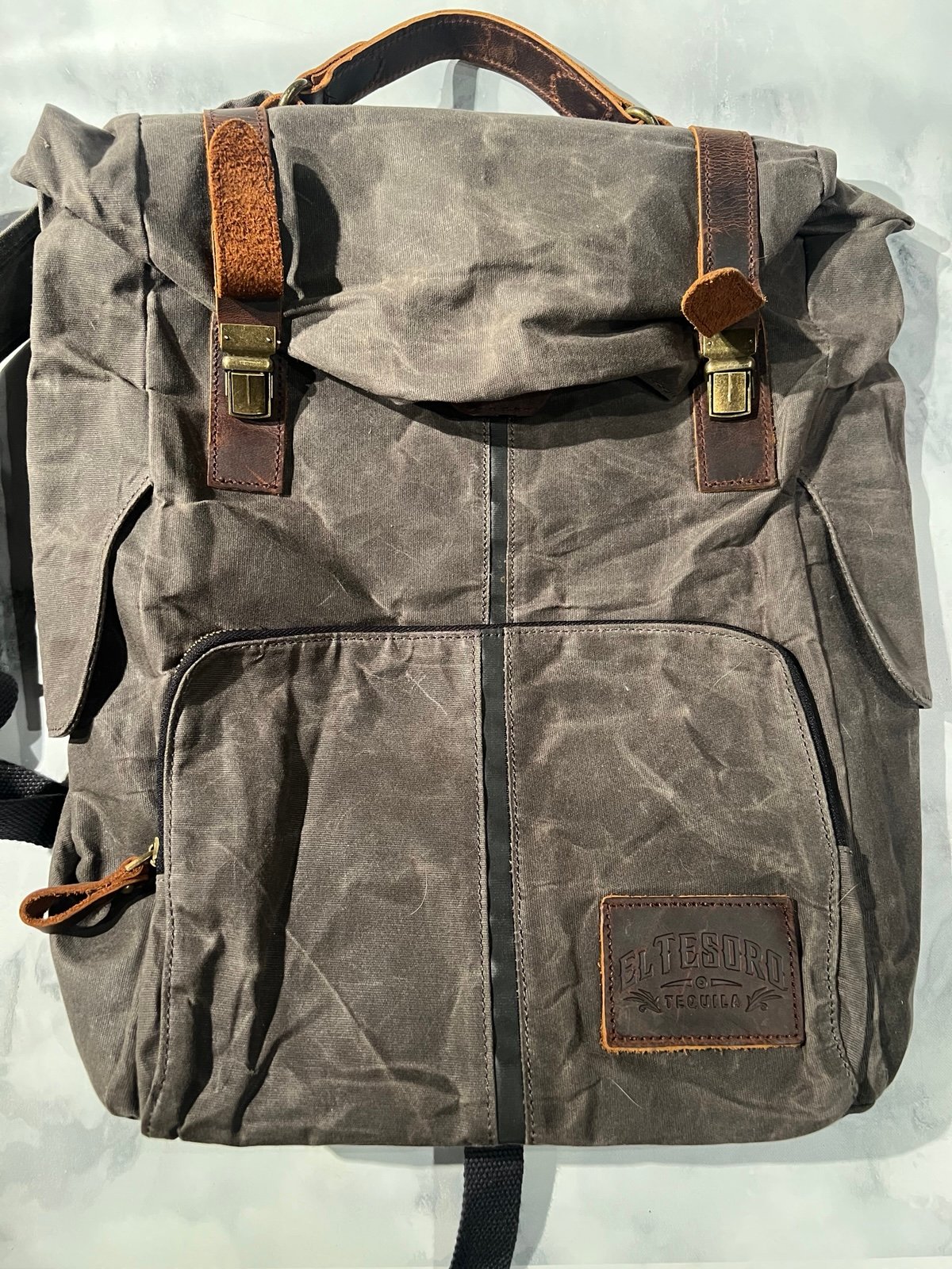 Waxed canvas and leather El Tesoro tequila backpack